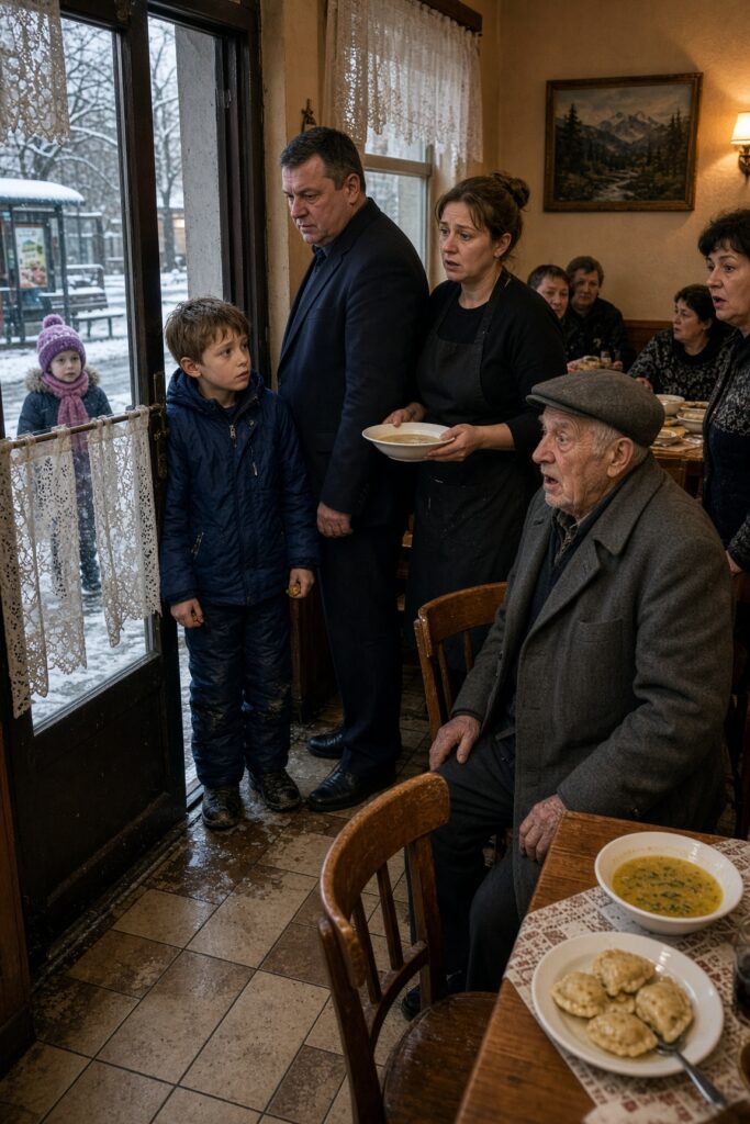 Głodny chłopiec przed polską restauracją
